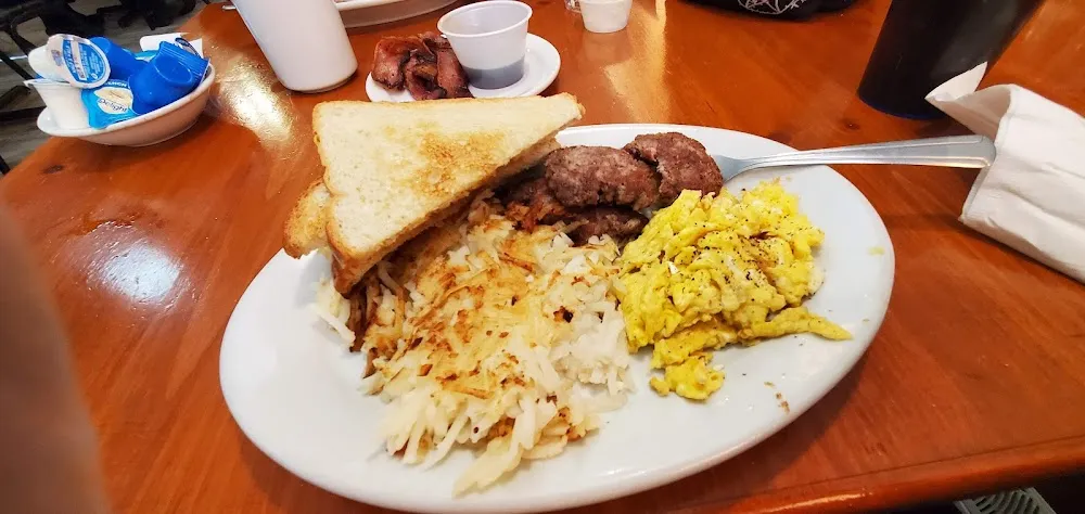 2 Eggs Scrambled Sausage Hashbrowns and Toast